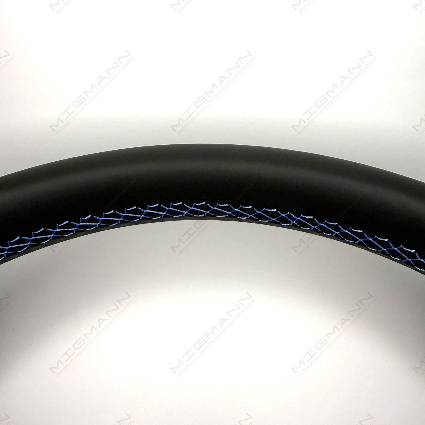 Close-up of blue GTE stitching on OEM Volkswagen steering wheel black leather