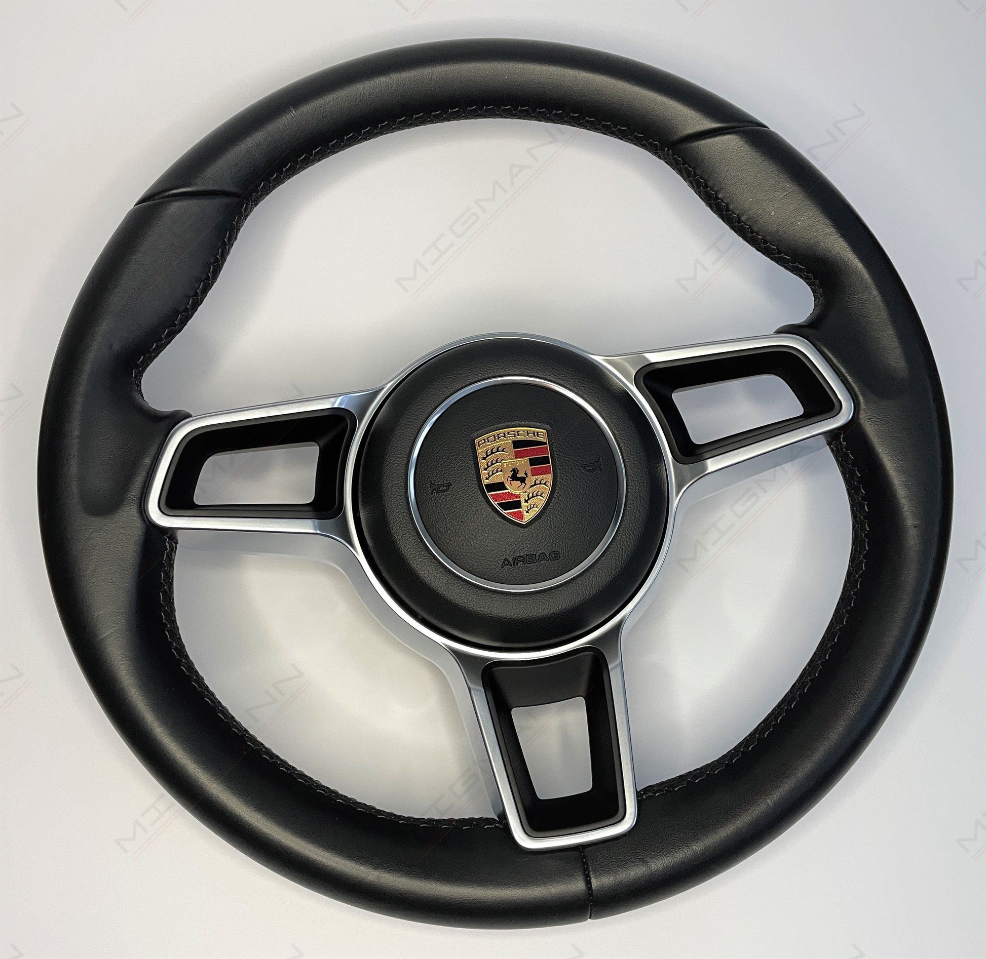 Side angle of Porsche 911 manual steering wheel – no paddles