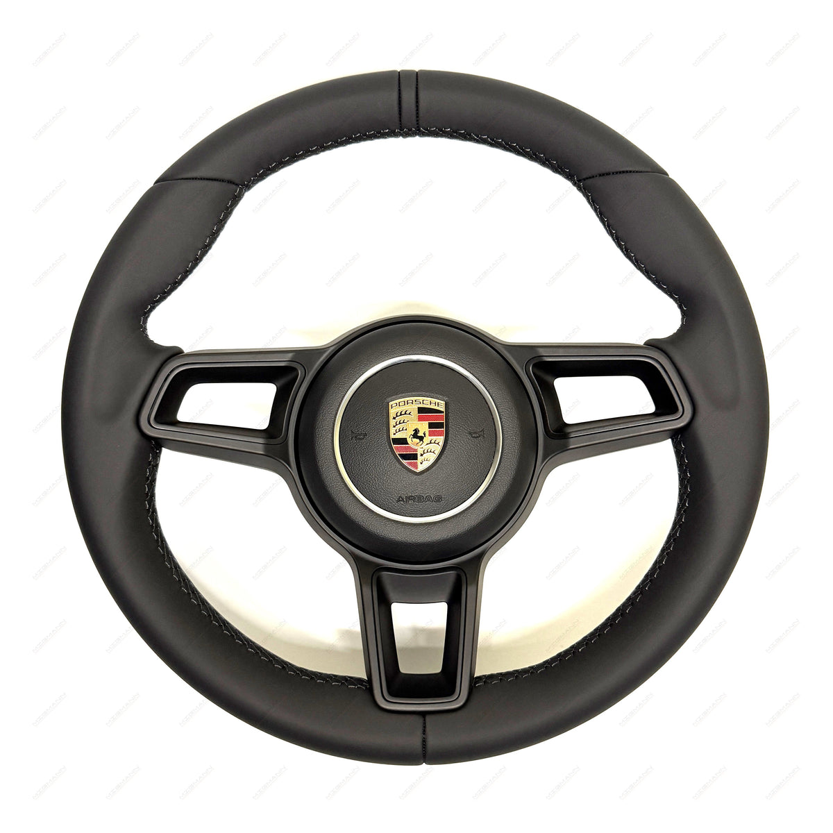 Porsche 911 black leather steering wheel with black trim and airbag