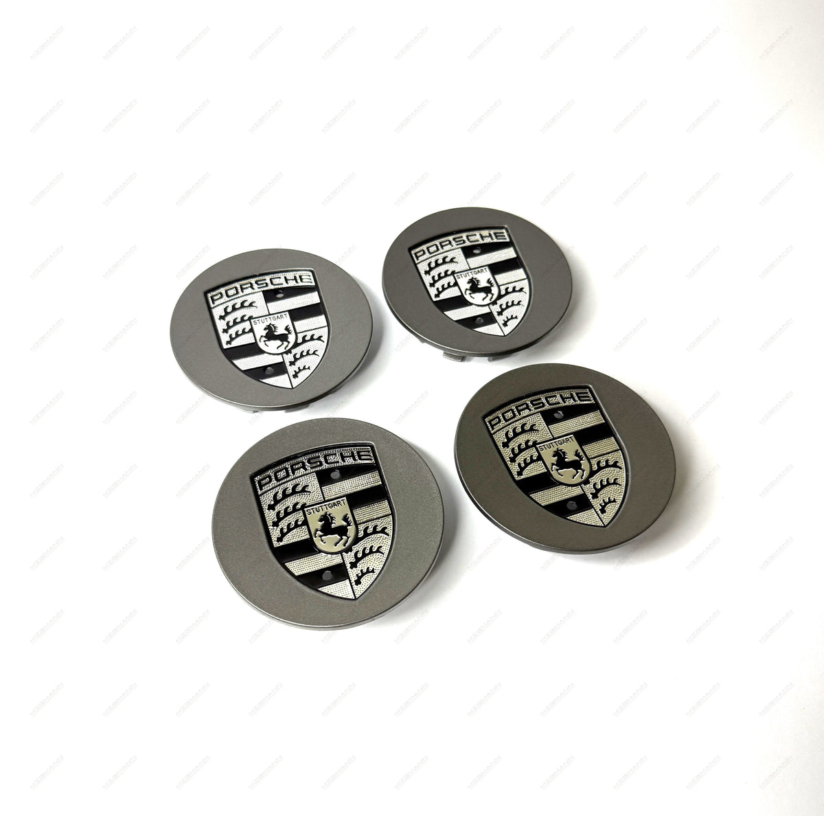 Porsche grey center caps with monochrome Porsche crest