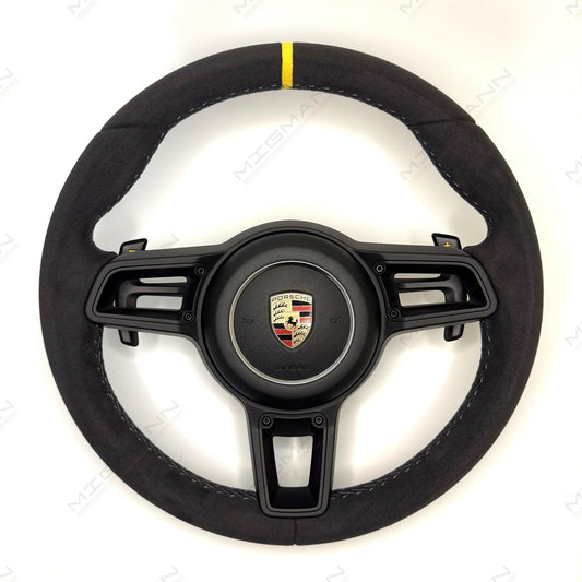 Front view of Porsche GT3 Alcantara steering wheel with yellow center stripe