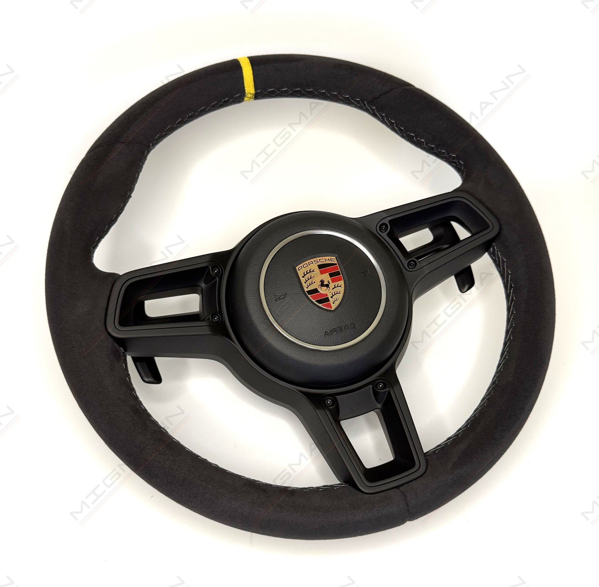 Side profile of GT3 steering wheel highlighting ergonomic design and premium Alcantara wrap