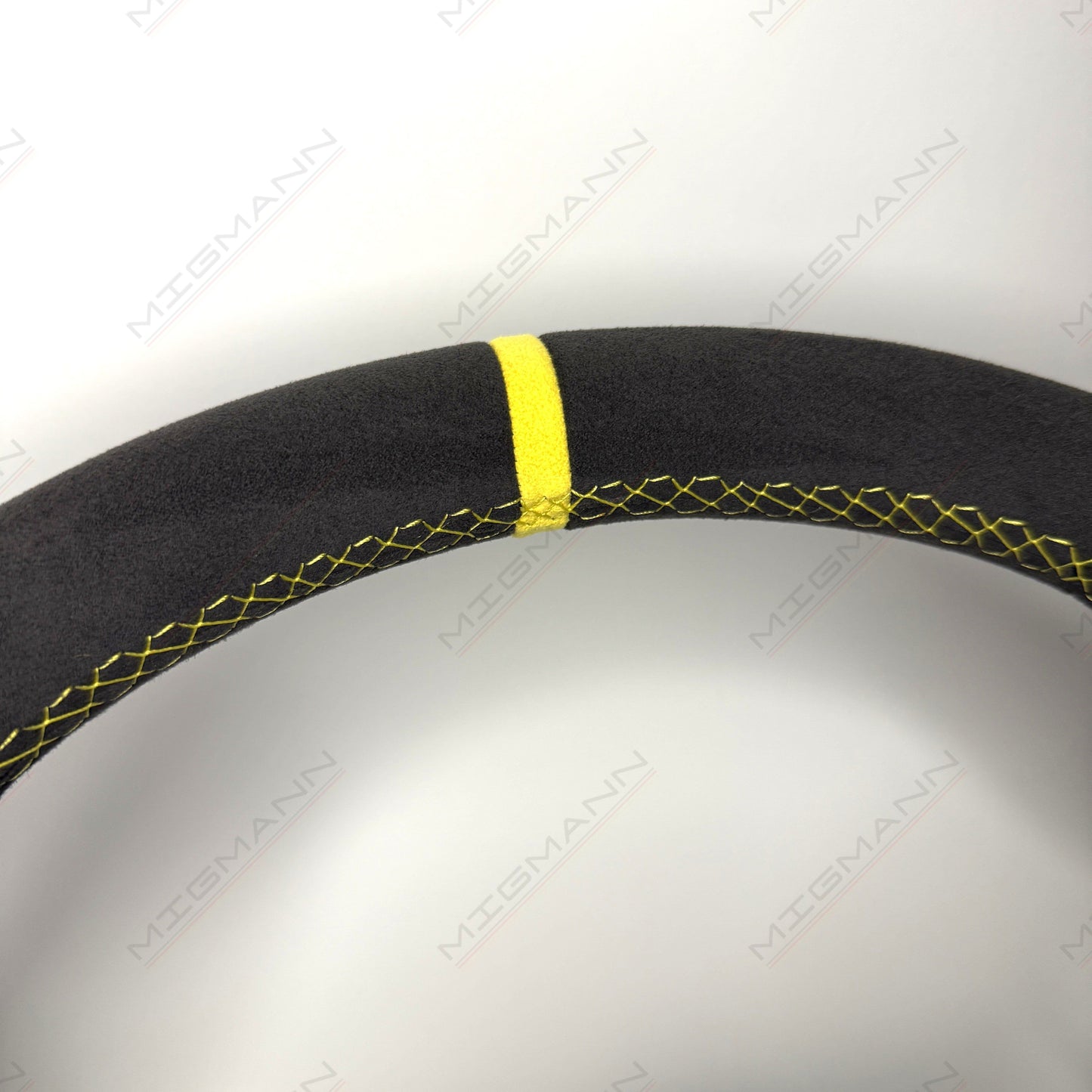 Yellow top marker detail on Porsche 911 Alcantara PDK steering wheel