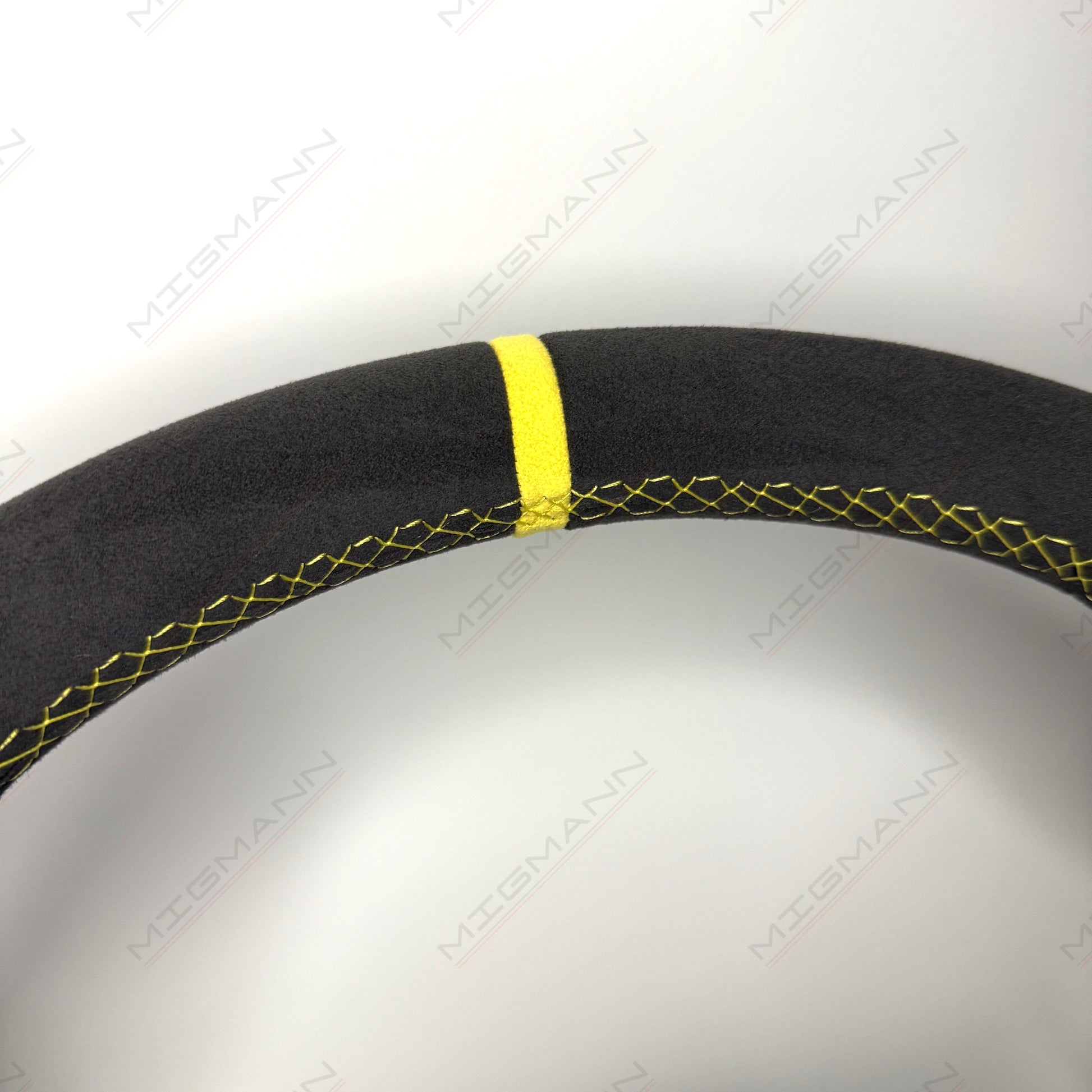 Yellow top marker detail on Porsche 911 Alcantara PDK steering wheel